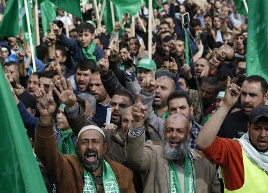 Hamas supporters are marking the 30th anniversary of the Palestinian resistance movement in Shechem, the occupied West Bank.jpg