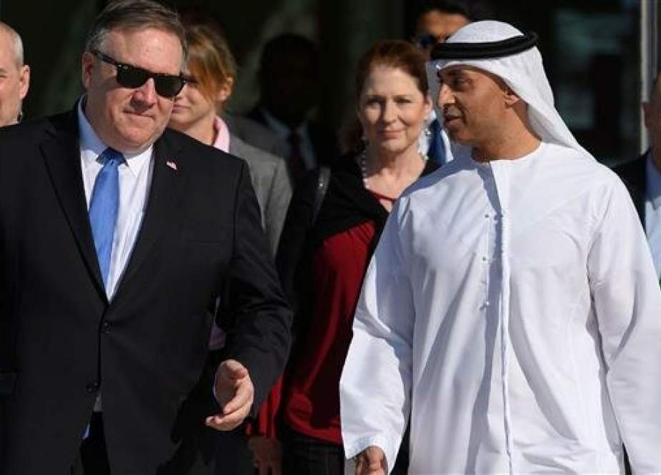 US Secretary of State Mike Pompeo with the Emirati Ambassador to the US Yousef Al Otaiba.jpg