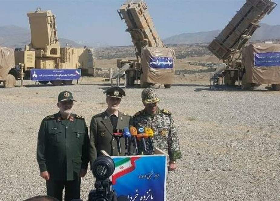 Iranian Defense Minister Brigadier General Amir Hatami (C) speaks during the unveiling ceremony of the Khordad 15 air defense system, on June 9, 2019.