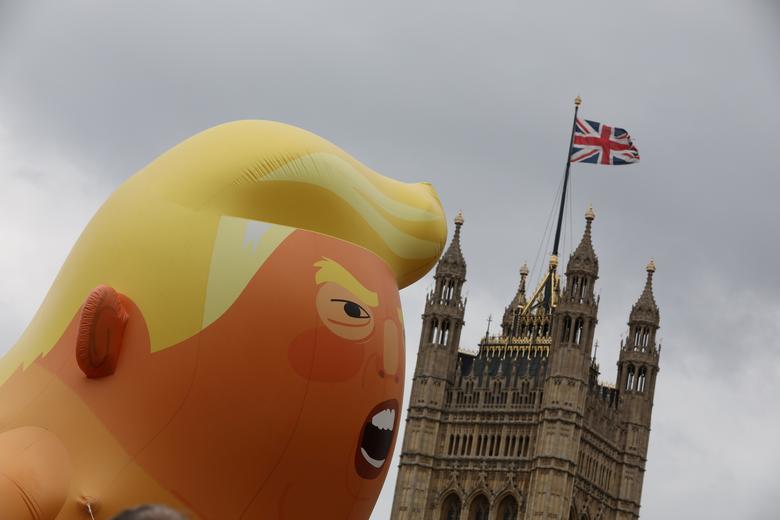 A giant inflatable blimp depicting Donald Trump as a pouting baby floats during an anti-Trump protest in London, June 4