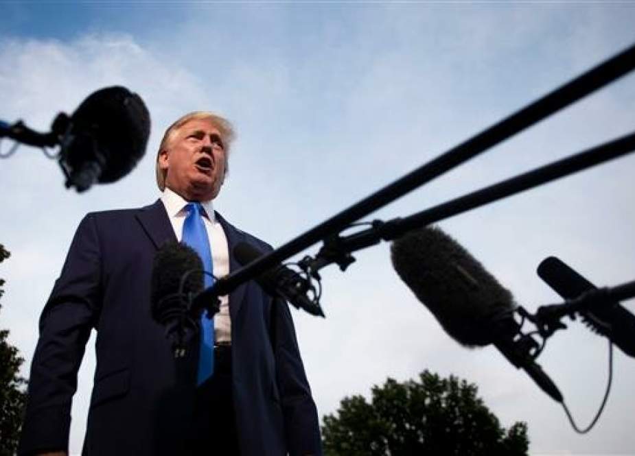 US President Donald Trump speaks with reporters as he departs the White House, in Washington, DC, on June 2, 2019. (Photo by AFP)