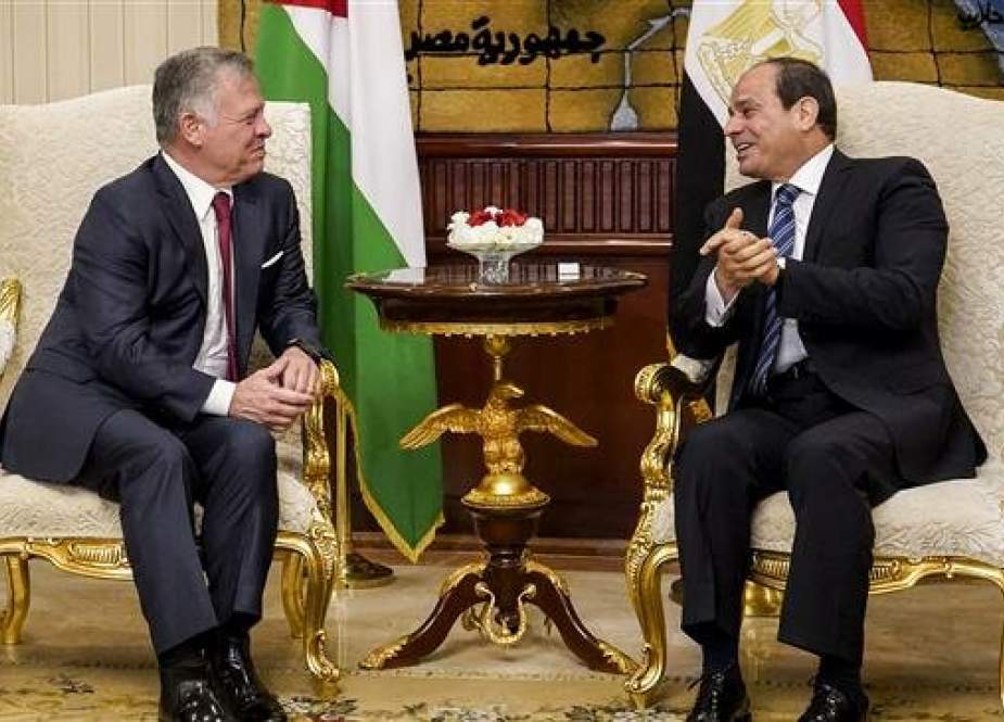 A handout picture released by the Jordanian Royal Palace on March 24, 2019 shows Jordan’s King Abdullah II (L) meeting with Egypt’s President Abdel Fattah el-Sisi in Cairo. (Via AFP)