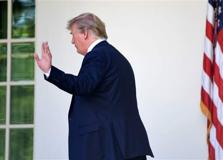 US President Donald Trump waves after speaking during an event about expanding health coverage options for small businesses and workers in the Rose Garden of the White House in Washington, DC, June 14, 2019. (AFP Photo)