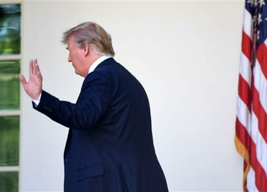 US President Donald Trump waves after speaking during an event in the Rose Garden of the White House in Washington, DC, June 14, 2019. (Photo by AFP)