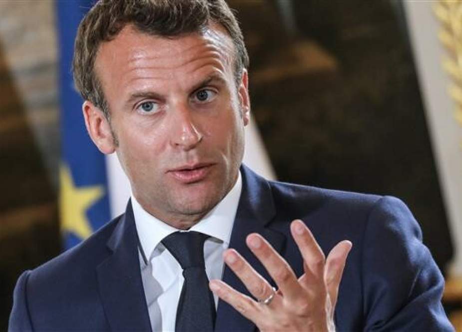 French President Emmanuel Macron attends a press conference following his meeting with Ukrainian counterpart Volodymyr Zelenskiy, at the Elysee presidential palace in Paris on June 17, 2019. (Photo by AFP)