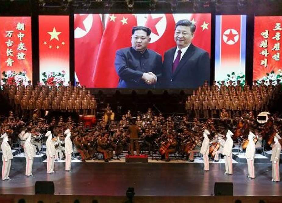 This image released on January 30, 2019, shows North Korean leader Kim Jong-un and China