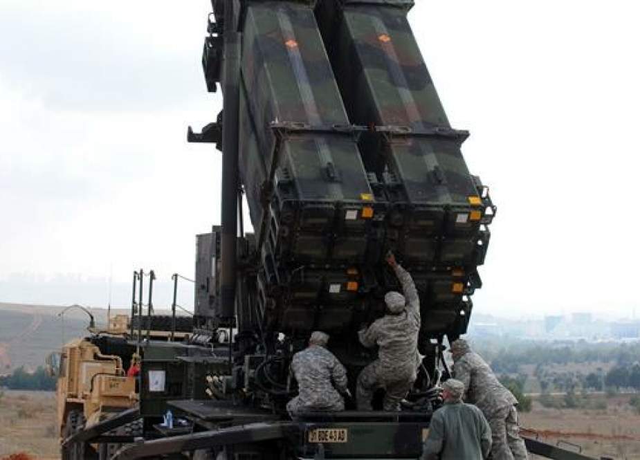 In this AFP file photo taken on February 05, 2013 US soldiers work on a Patriot missile system at a Turkish military base in Gaziantep.