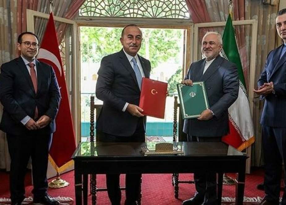 Iranian Foreign Minister Mohammad Javad Zarif and his Turkish counterpart Mevlut Cavusoglu.jpg