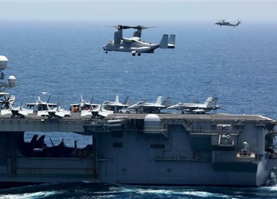 This handout picture released by the US Navy on May 17, 2019 shows an MV-22 Osprey from Marine Medium Tiltrotor Squadron (VMM-264) preparing to land on the flight deck of the Nimitz-class aircraft carrier USS Abraham Lincoln (CVN 72) in the Arabian Sea. (Photo via AFP)