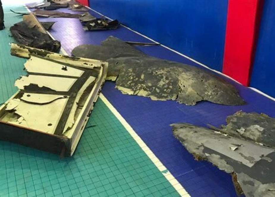 Photo of the wreckage of a US spy drone shot down by the IRGC air defense forces on Thursday morning. The debris was displayed on Friday. (Photo by IRIB News Agency)