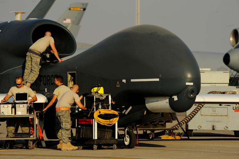 U.S. Air Force maintainers prepare a RQ-4A Global Hawk for takeoff at an undisclosed location in Southwest Asia, December 2, 2010
