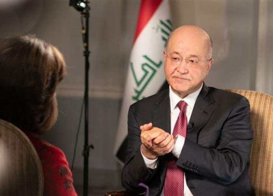 Iraqi President Barham Salih speaks with CNN during an interview.jpg