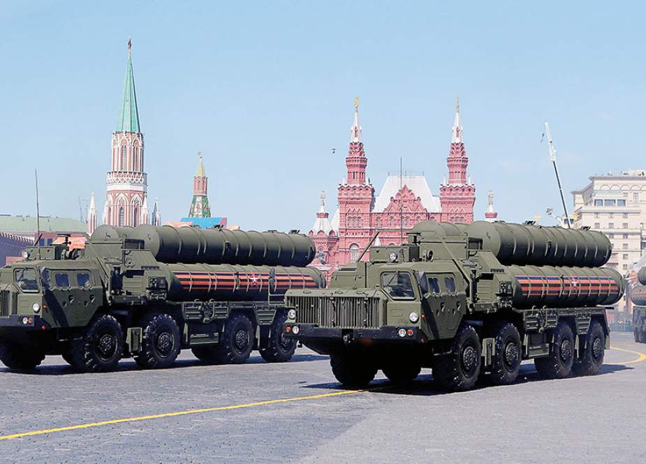 Russian servicemen drive S-400 missile air defense systems during ta parade at Red Square in Moscow, May 9, 2018.