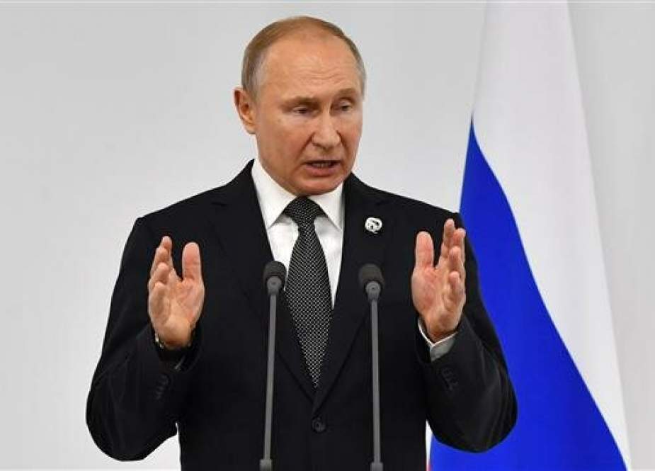 Russian President Vladimir Putin speaks during his press conference on the sidelines of the G-20 summit in Osaka on June 29, 2019. (Photo by AFP)