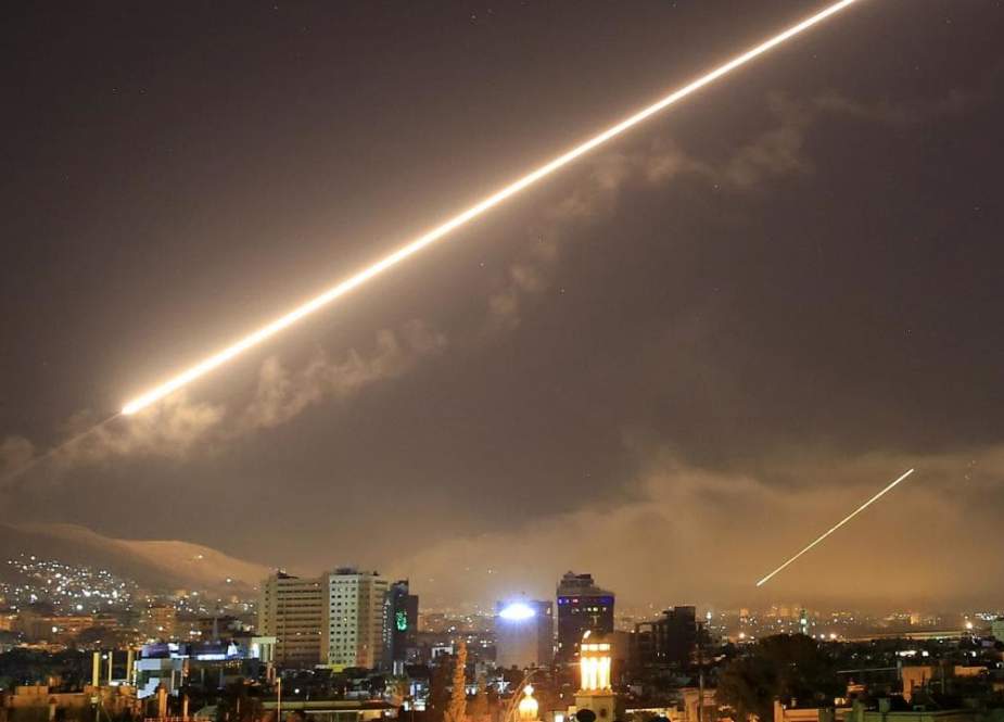 The Damascus sky lights up missile fire, as the US launches an attack on Syria targeting different parts of the capital, early April 14, 2018. (Photo by AP)