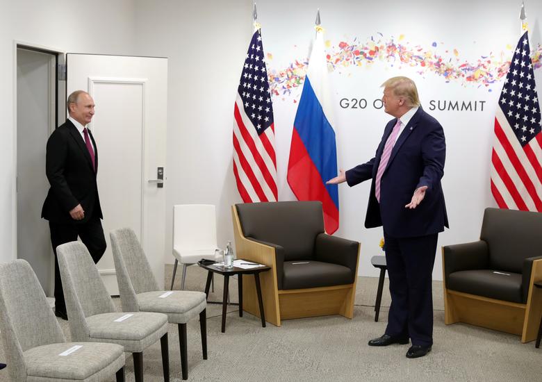 Russia's President Vladimir Putin and U.S. President Donald Trump meet, June 28