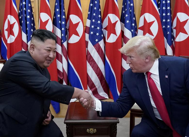 President Trump meets with Kim Jong Un at the demilitarized zone separating the two Koreas, in Panmunjom, South Korea. Trump tweeted the invitation only on Saturday to Kim to join him as he toured the DMZ, a meeting he had said would probably last only f