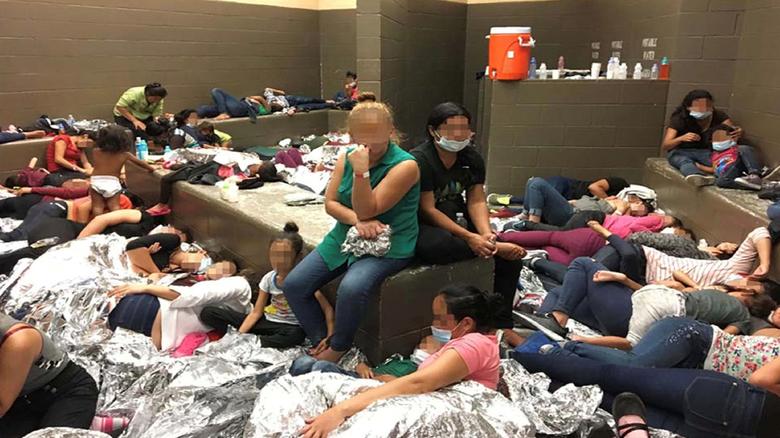 An overcrowded area holding families at a Border Patrol station is seen in a still image from video in Weslaco, Texas, on June 11, 2019. Picture pixelated at source