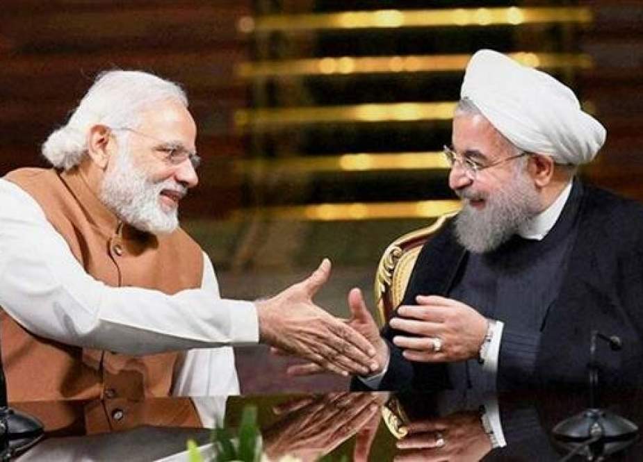 File photo of Indian Prime Minister Narendra Modi (L) and Iranian President Hassan Rouhani (Photo by PTI)