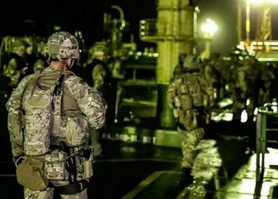 A detachment of 30 UK marines boarding the Iranian super tanker Grace 1 in the early hours after its seizure on July 4, 2019. (Photo by UK Ministry of Defense)