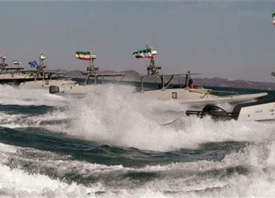 Iran military forces during a drill in the Strait of Hormuz in the Persian Gulf waters.jpg