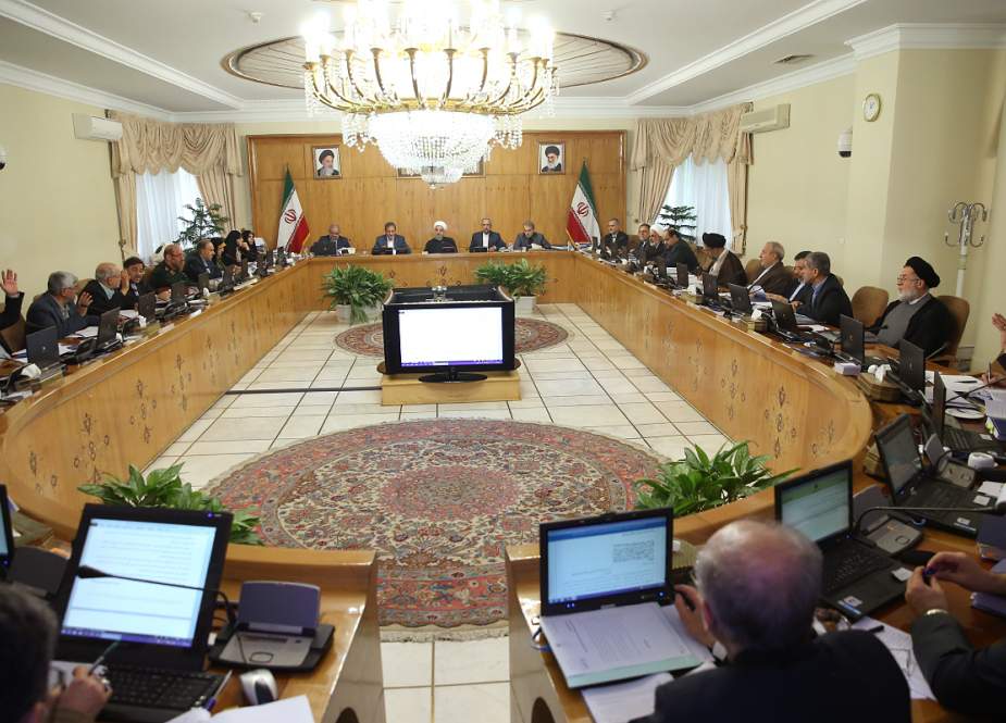 This photo by the office of Iranian president Hassan Rouhani shows him (center) leading a cabinet session in Tehran on July 3, 2019