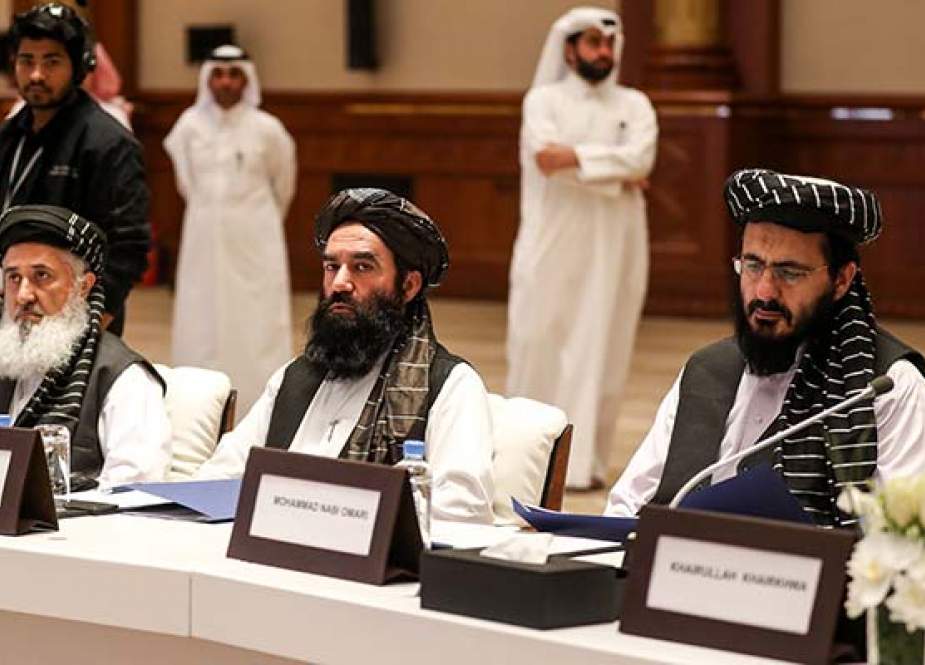 Noorullah Noori (C) and Mohammad Nabi Omari (R), members of the Taliban who were former prisoners held by the US at Guantanamo Bay and reportedly released in 2014 in a prisoner exchange, attend the Intra Afghan Dialogue talks in the Qatari capital Doha on July 7, 2019.