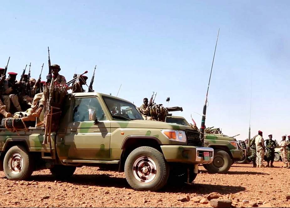 Members of the Rapid Support Forces (RSF) secure the area for a rally by the supporters of Sudan’s ruling Transitional Military Council (TMC) in the village of Abraq, about 60 kilometers northwest of Khartoum, on June 22, 2019.