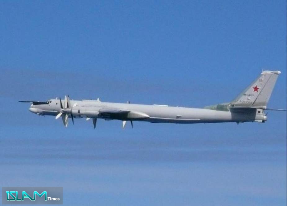A Russian TU-95 bomber flies over East China Sea in this handout picture taken by Japan Air Self-Defence Force and released by the Joint Staff Office of the Defense Ministry of Japan July 23, 2019. Joint Staff Office of the Defense Ministry of Japan/HANDOUT via REUTERS