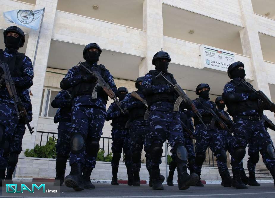 Palestinian policemen participate in a training session at their headquarters in the occupied West Bank city of Hebron