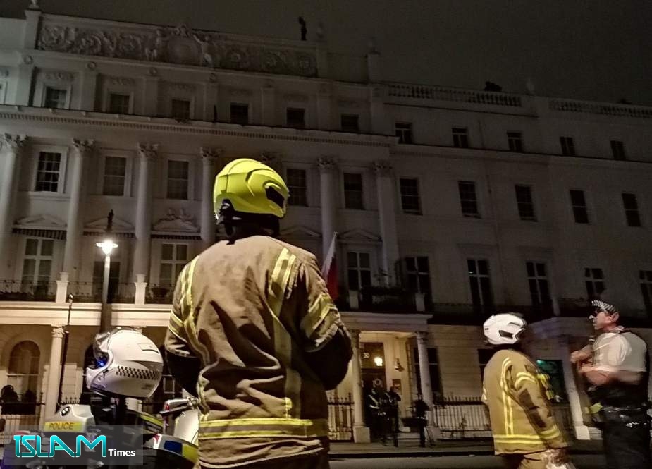 A frame grab shows first-responders deployed to the area in front of the Bahraini Embassy in London, where embassy staffers reportedly attempted to throw a protester off the rooftop, on July 27, 2019.