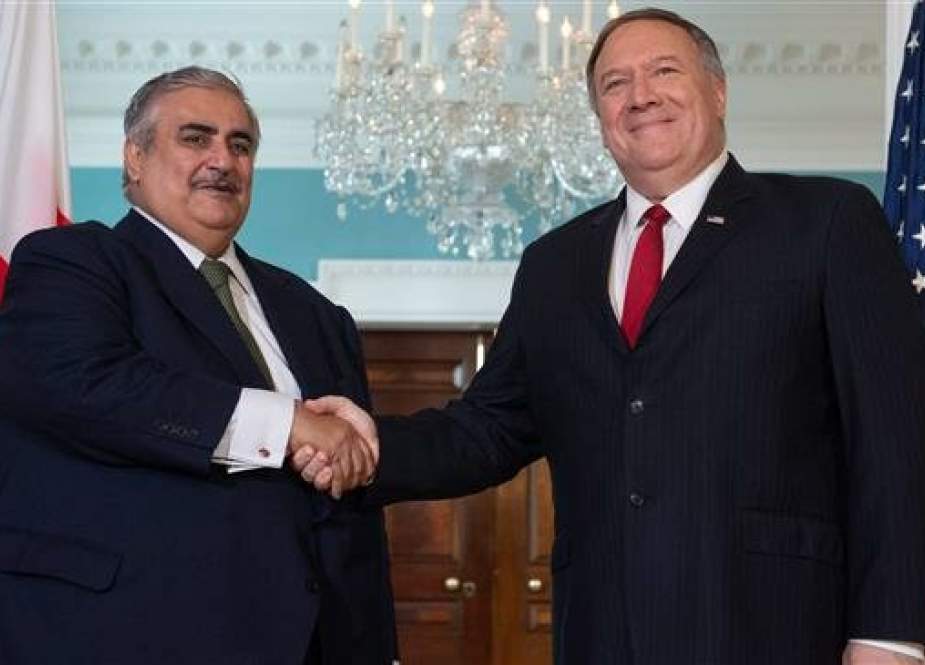 US Secretary of State Mike Pompeo shakes hands with Bahraini Foreign Minister Khalid bin Ahmed Al Khalifah in Washington, DC.jpg