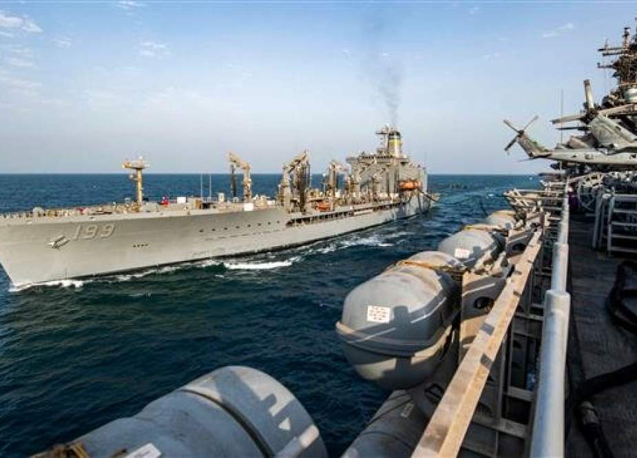 USS Boxer (LHD 4) with fleet replenishment oiler ship USNS Tippecanoe (T-AO 199) in the Persian Gulf waters.jpg