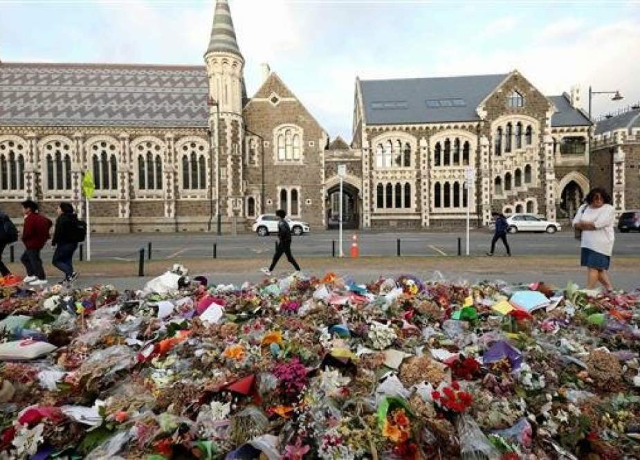 Flowers in memory of the twin mosque massacre victims outside the Botanical Gardens in Christchurch, New Zealand.jpg