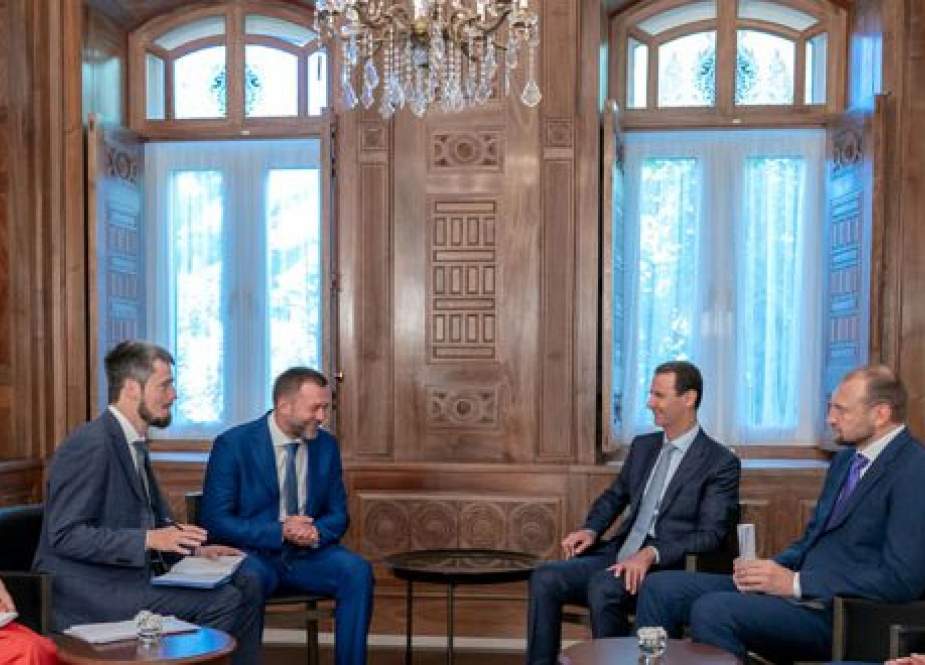 Syrian President Bashar al-Assad  with a delegation of the Unified Russia party headed by Russian State Duma member Dmitry Sablin.jpg