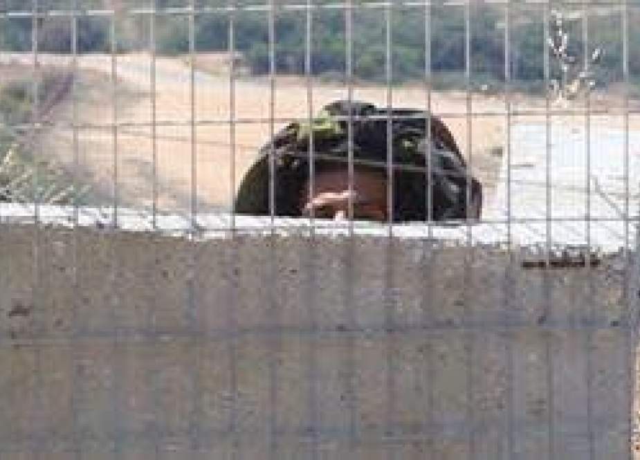 Israeli soldier hiding in a military post at the border between Lebanon and the occupied territories.jpg
