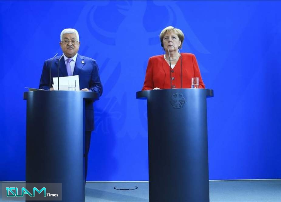 Palestinian President Mahmoud Abbas at a joint conference with German Chancellor Angela Merkel