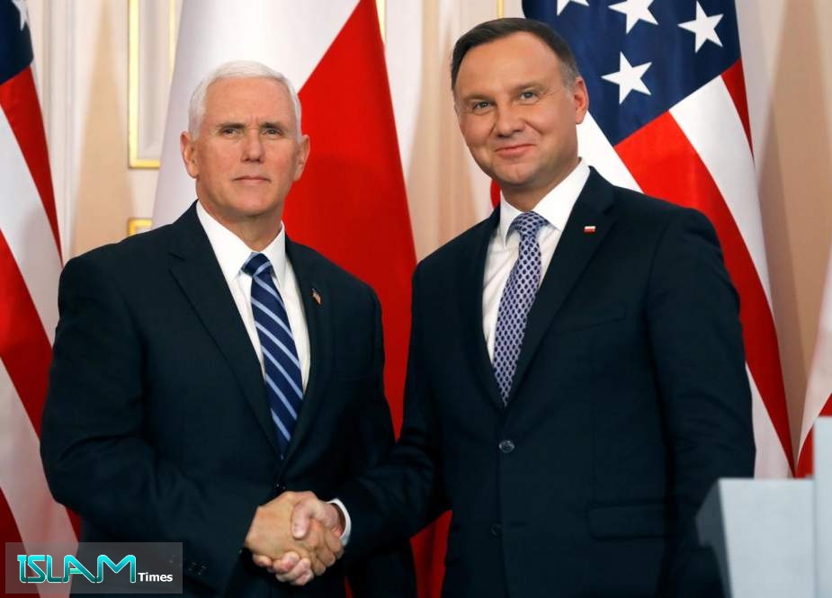Polish President Andrzej Duda shakes hand with US Vice President Mike Pence