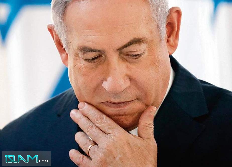 Israeli Prime Minister Benjamin Netanyahu gestures during a weekly cabinet meeting in the Jordan Valley