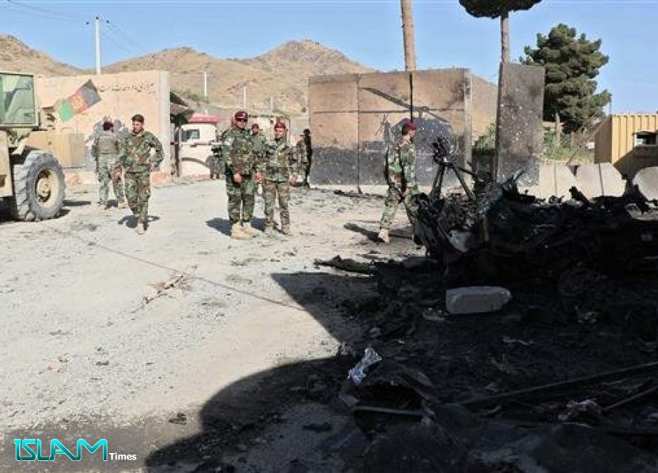 Afghan National Army (ANA) solders inspect the site of a car bomb attack near a base of elite Afghan Special Forces in Char Asiab district, south of the capital, Kabul, on September 12, 2019.