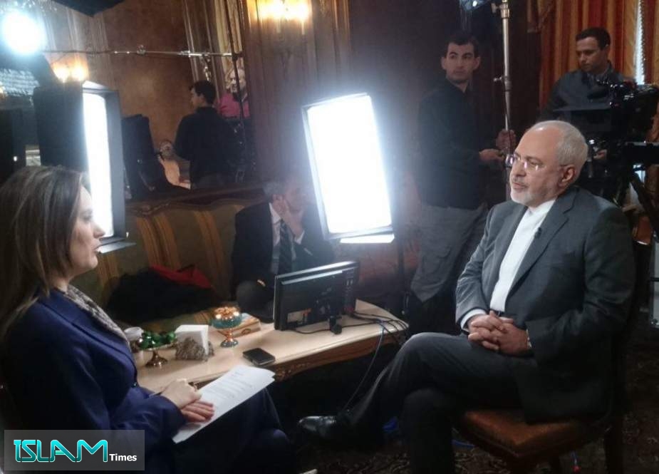 This photo taken on September 22, 2019 at Iran’s United Nations mission in New York shows Foreign Minister Mohammad Javad Zarif speaking to Margaret Brennan of the CBS News in an interview for the Face the Nation program planned to be broadcast a day later.