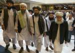 In this May 28, 2019 file photo, Mullah Abdul Ghani Baradar, the Taliban group’s top political leader (3rd-L) arrives with other members of the Taliban delegation for talks in Moscow, Russia.