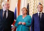 Boris Johnson, Angela Merkel and Emmanuel Macron