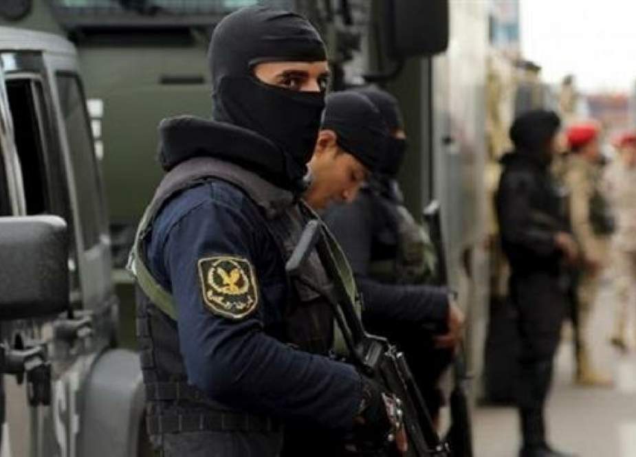 Egyptian security forces standing guard in Alexandria, Egypt.jpg