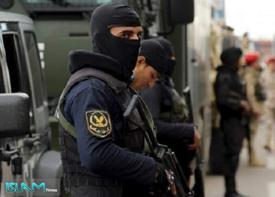 The file photo shows Egyptian security forces standing guard in Alexandria, Egypt.