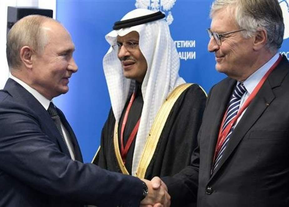 Russian President Vladimir Putin with World Energy Council Chairman Jean-Marie Dauger, and Saudi Energy Minister Abdulaziz Bin Salman.jpg