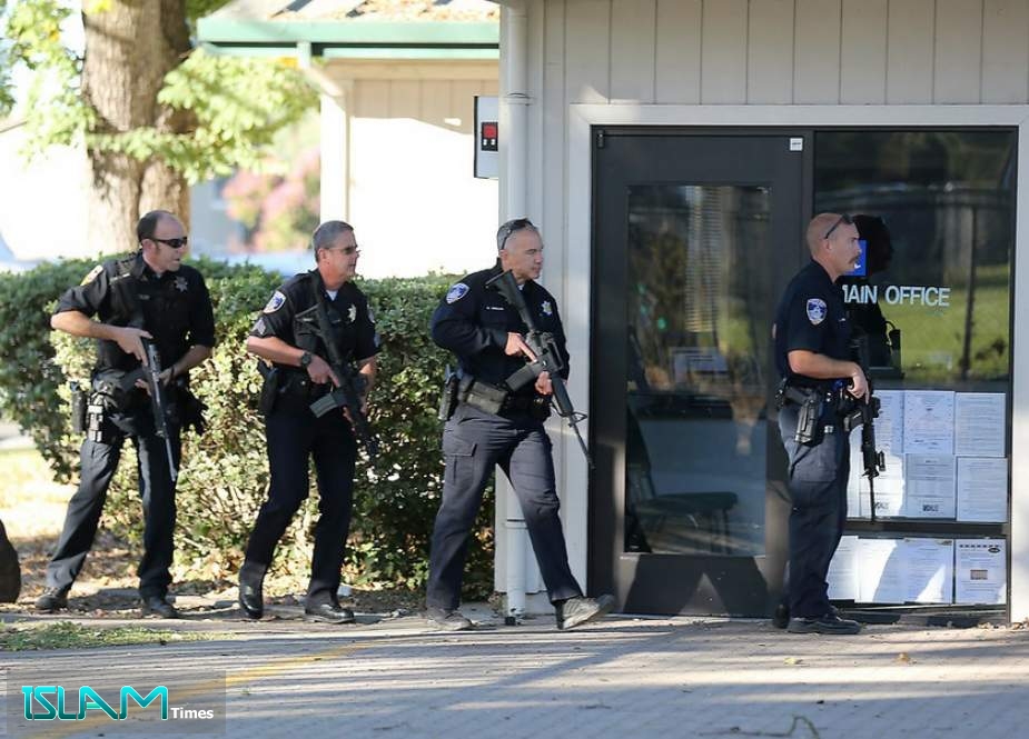 Police officers after a shooting near Ridgway High School in Santa Rosa, Calif.CreditBeth Schlanker/The Press Democrat, via Associated Press
