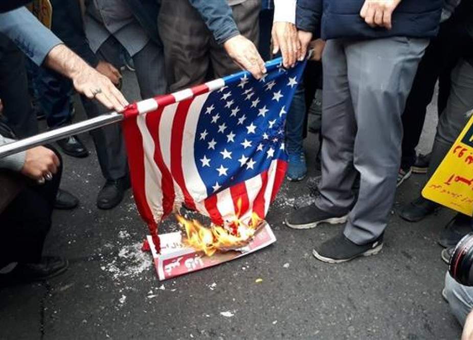 Iranian demonstrators set on fire a United States Stars and Stripes.jpg