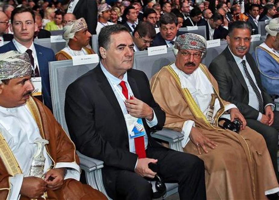 Israel Katz sits next to Omani officials in the International Road Transport Union World Congress in Muscat, Oman..jpg