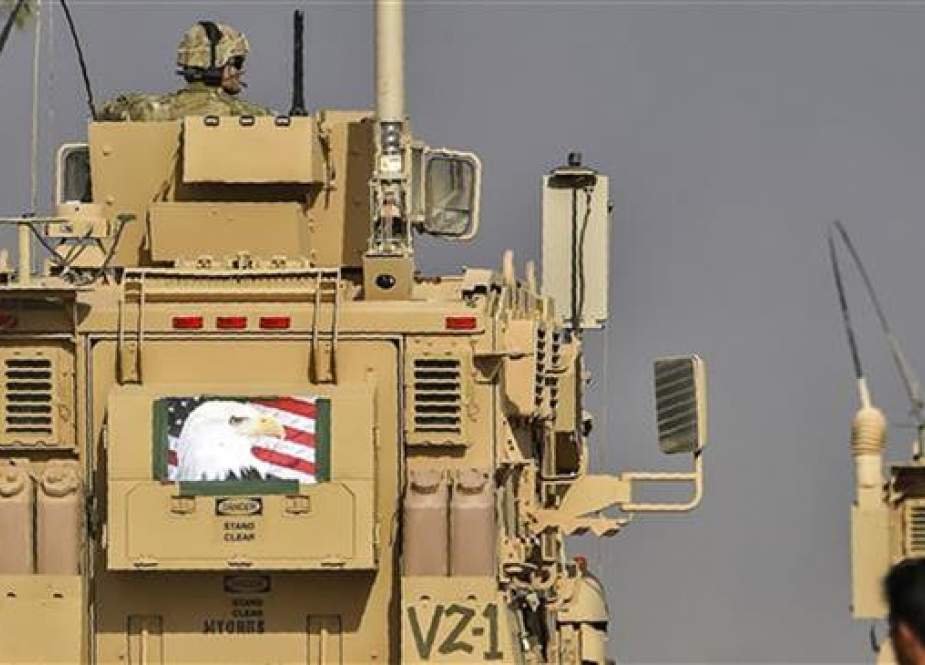 American armored vehicles are seen at the Qayyarah military base in Nineveh Province.jpg